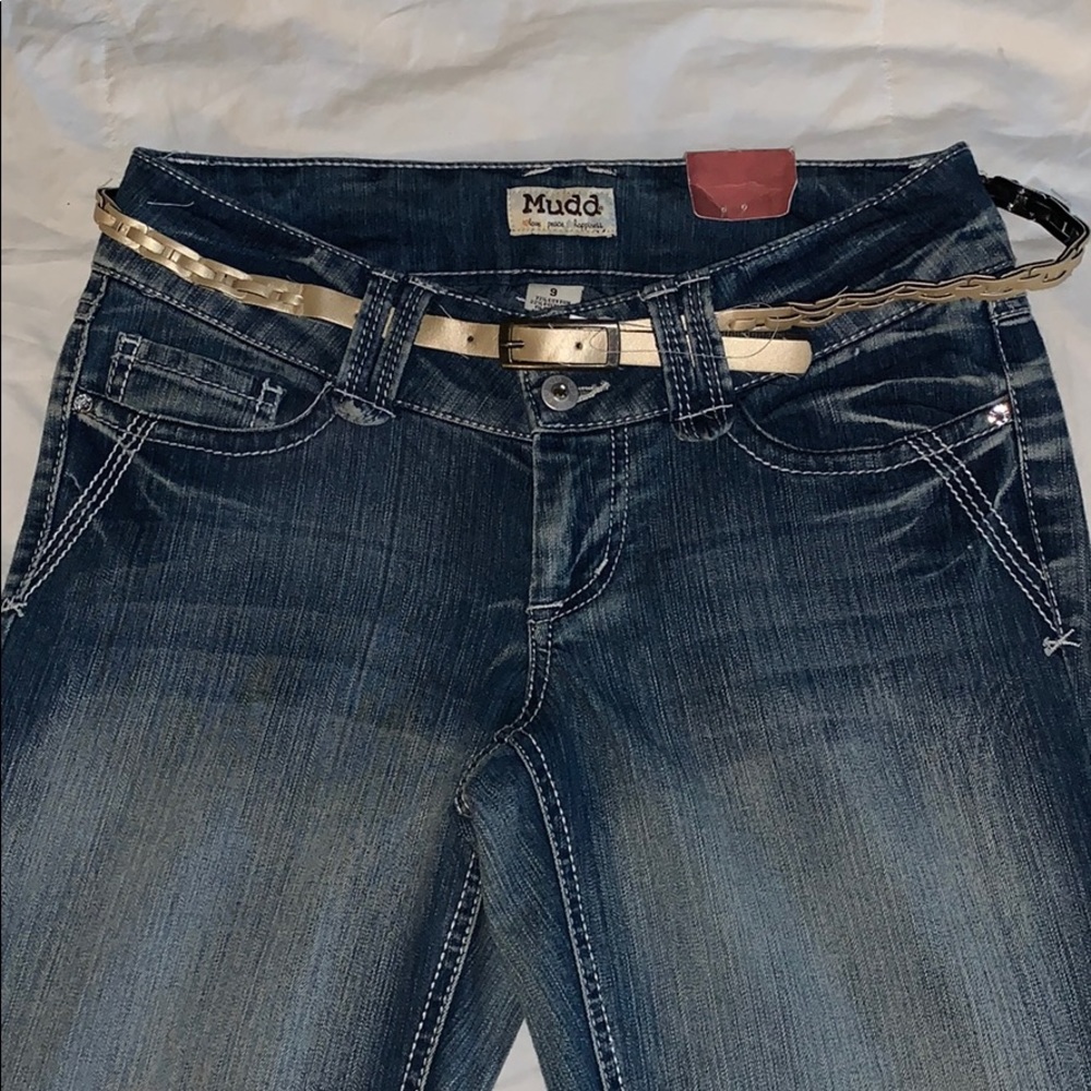 Brand new flare leg “worn effect” denim jeans.